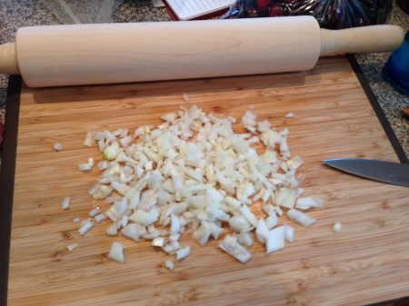 The maple rolling pin next to the more seasoned bamboo board.